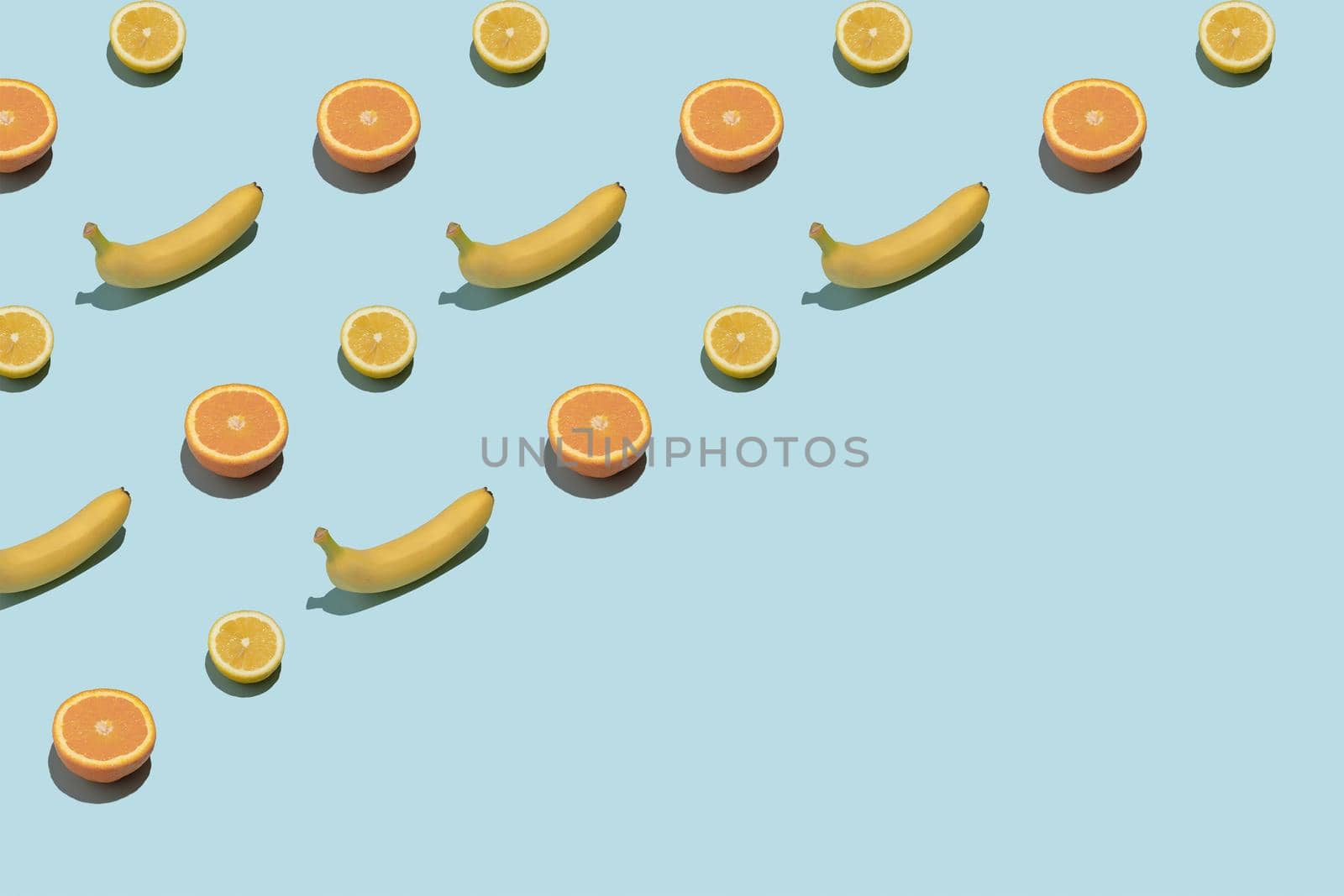 Summer tropical pattern banana orange lemon. by sergii_gnatiuk