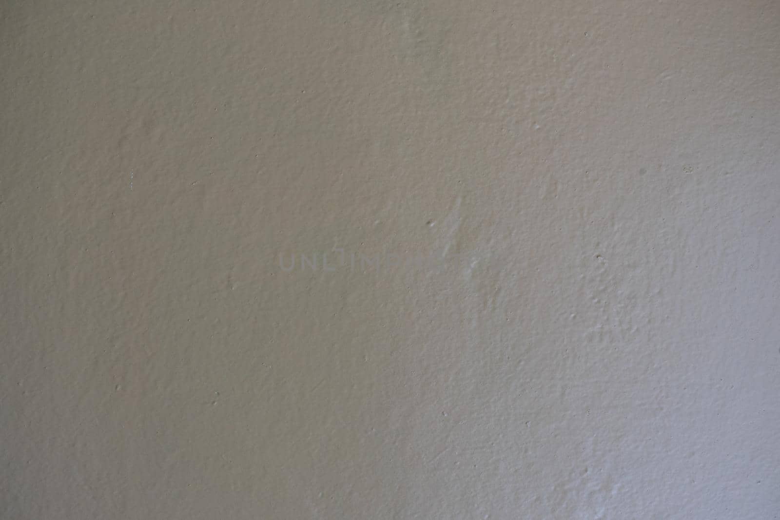 Gray yellow painted wall. Gradient background.