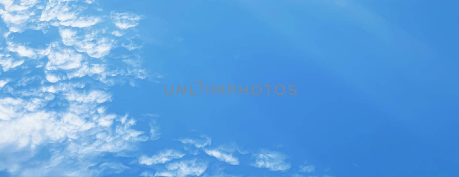 Sunny blue sky as abstract background, beauty in nature design by Anneleven