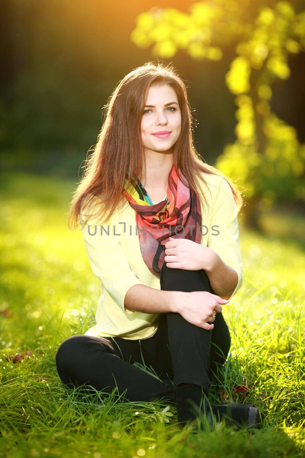 Attractive young woman enjoying her time outside in park