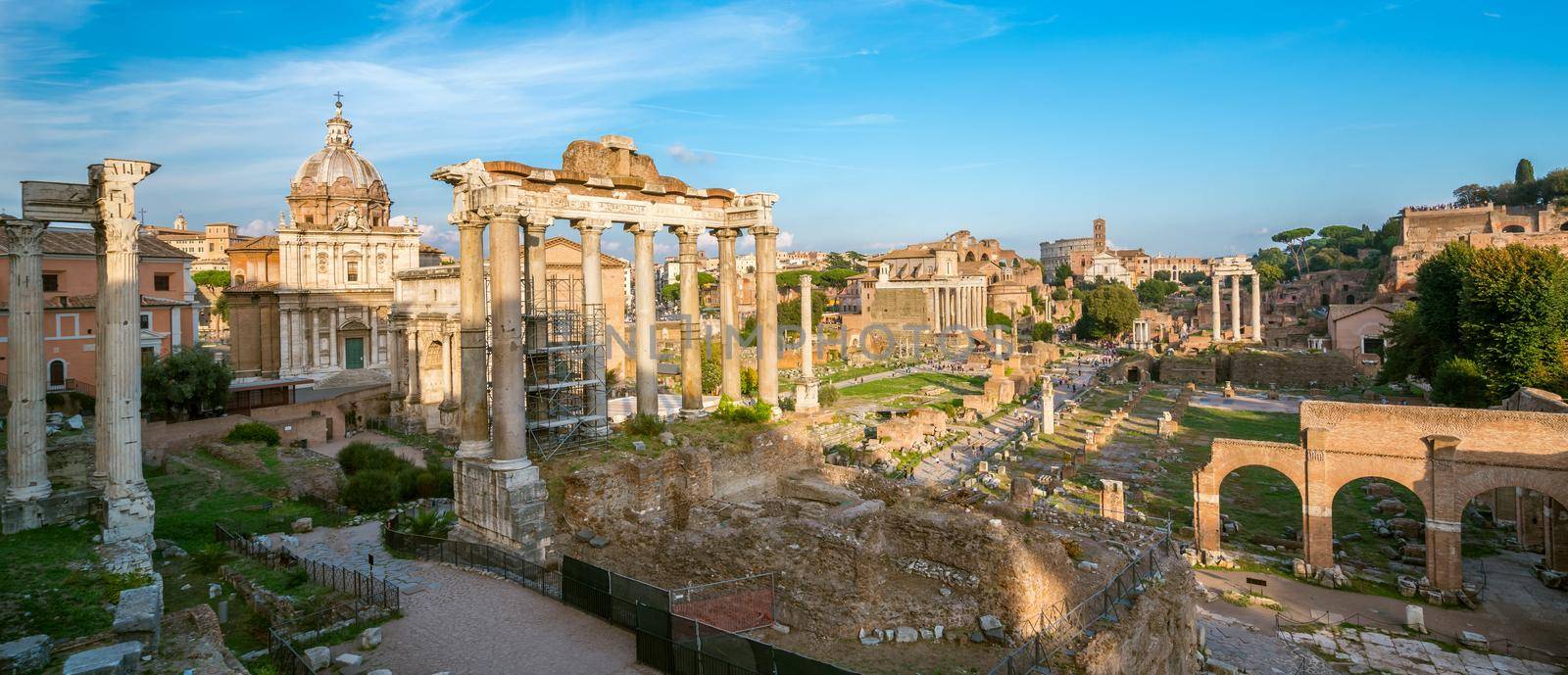 Roman Forum in Rome , Italy . Roman Forum was build in time of Ancient Rome as the site of triumphal processions and elections. It is famous tourist attraction of Rome , Italy .