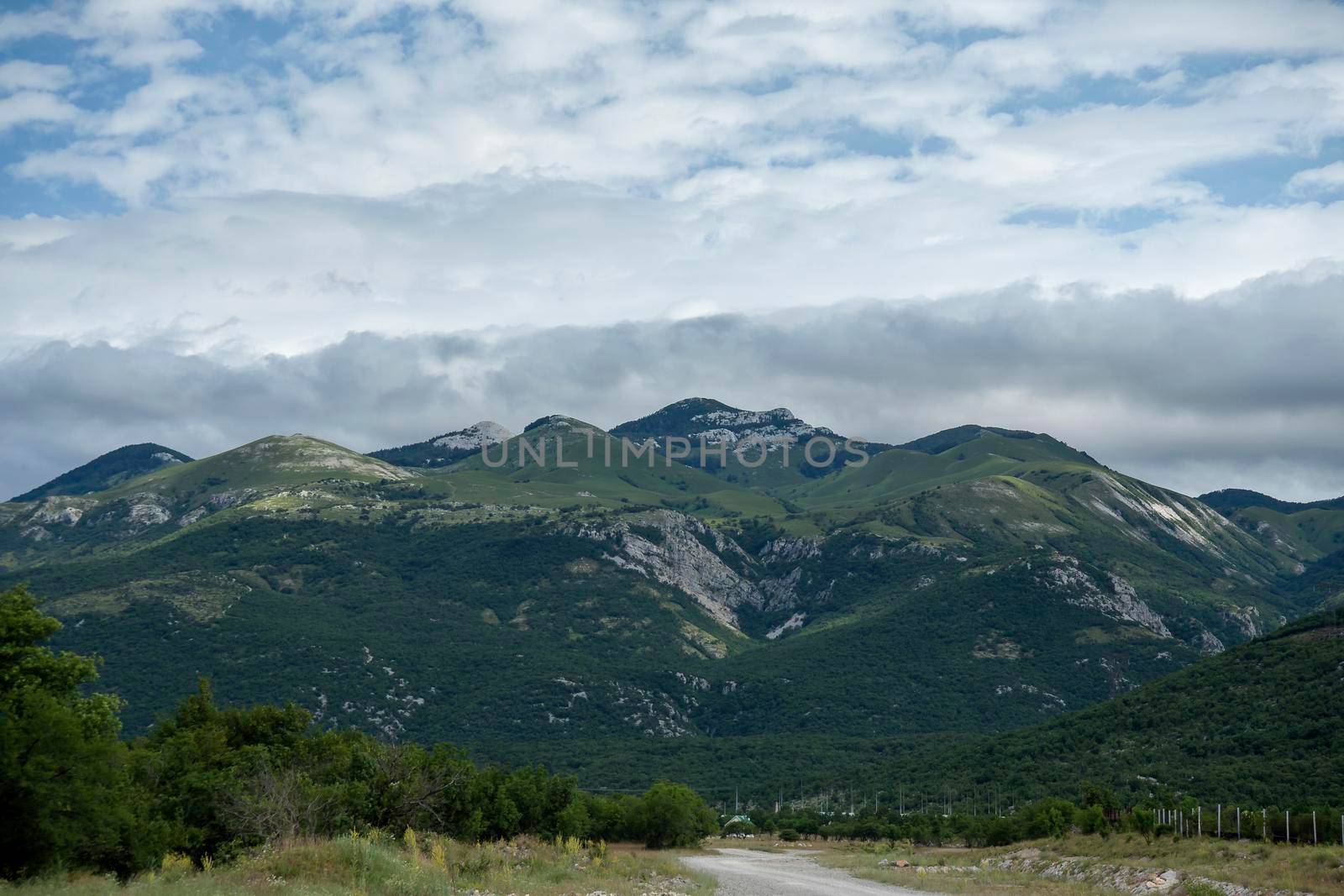 White clouds over Velebit mountains from Grobnik, Pothum, Croatia. Look on national park Velebit.