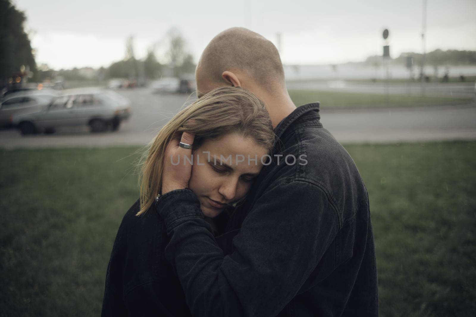 the guy hugs his beloved very gently and sensually, selective focus