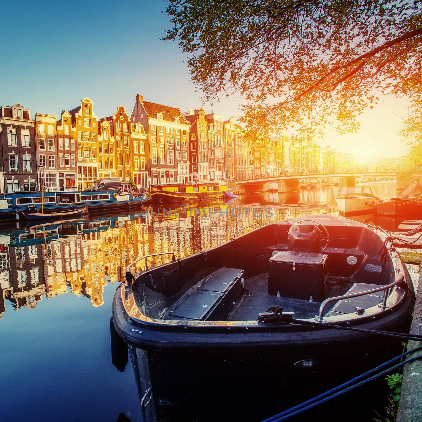 Canal at sunset. Amsterdam is the capital and most populous city in Netherlands.