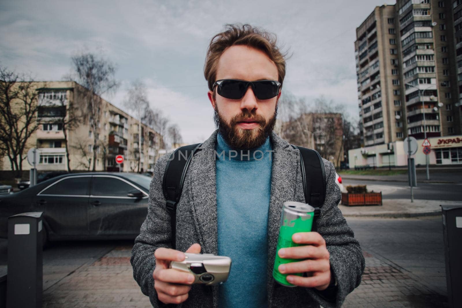 fashion Portrait of young bearded man. Smiling Hipster boy.handsome. Brutal bearded boy