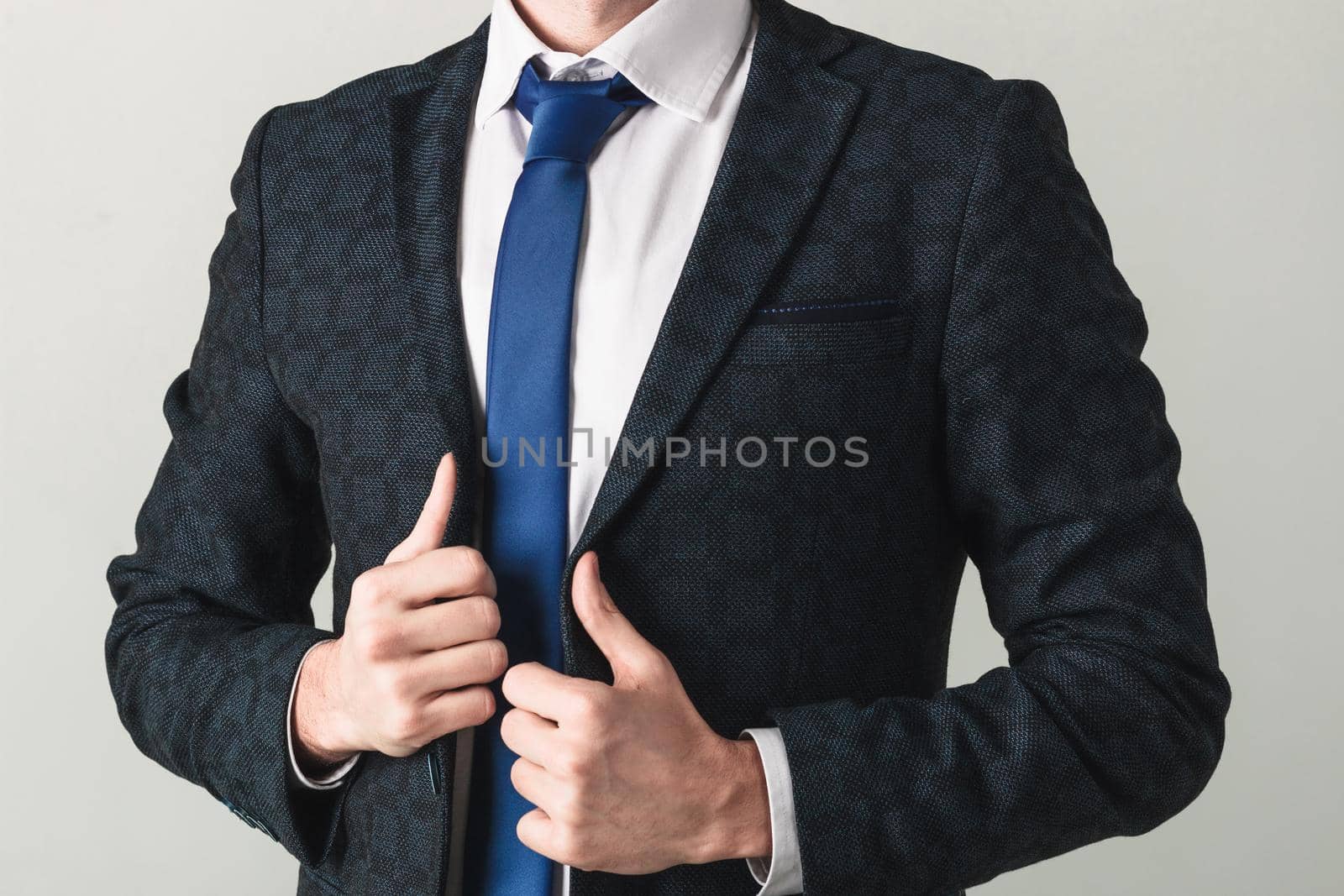 Portrait of a handsome CEO cross hands by Symonenko