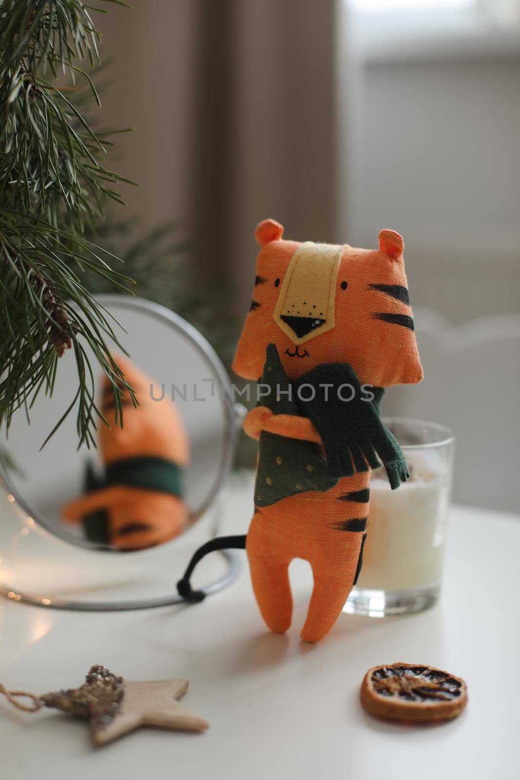 cute soft toy tiger - symbol of 2022, oriental calendar concept. High quality photo