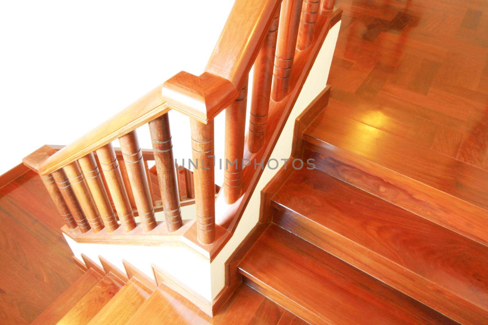 Wooden stairs and handrail isolated on white background