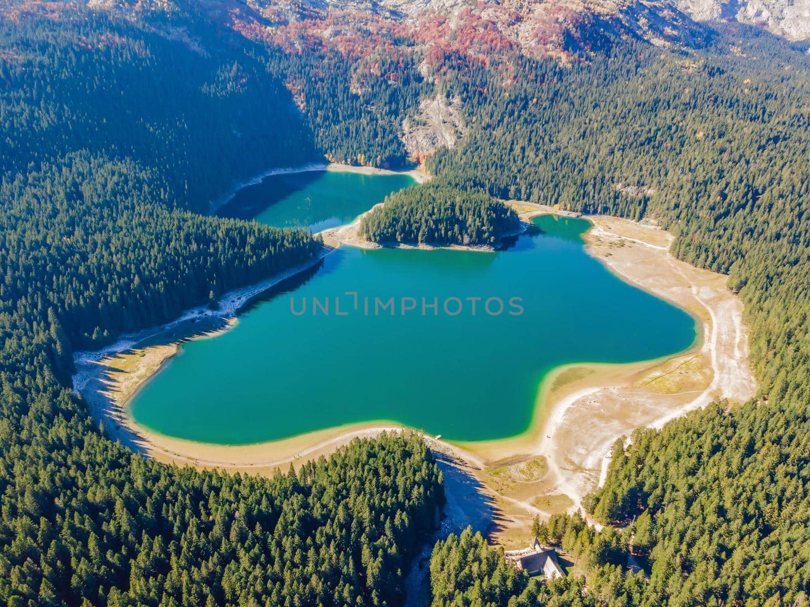 Aerial view on Black lake in National park Durmitor. Montenegro. Travel around Montenegro concept.