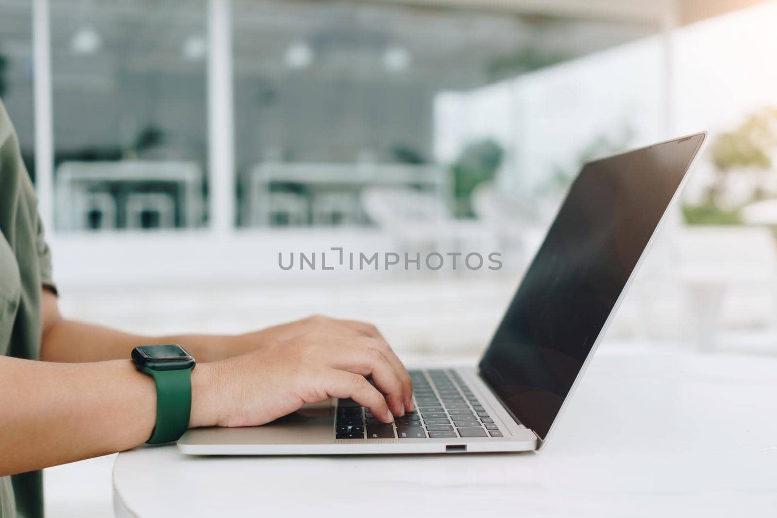 People using laptop to work study on work desk. Business, financial, trade stock maket and social network. by Suwant