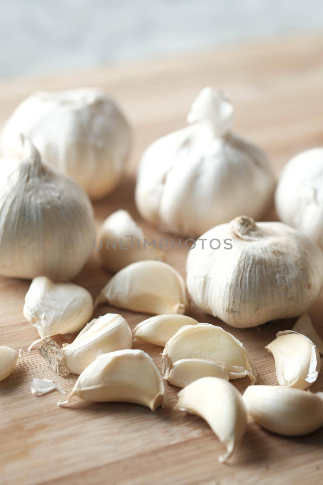 close up pf garlic on chopping board on table ,