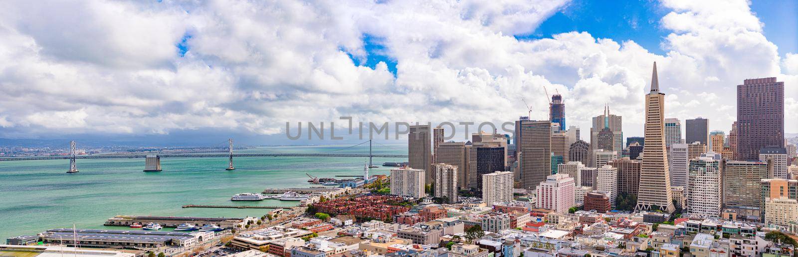 San Francisco city downtown panoramic view with blue cloudy sky in background. California, USA