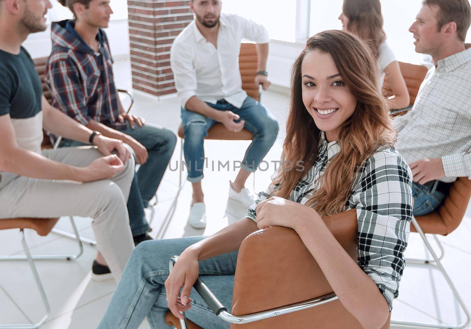 group of young talented employees sitting in the office