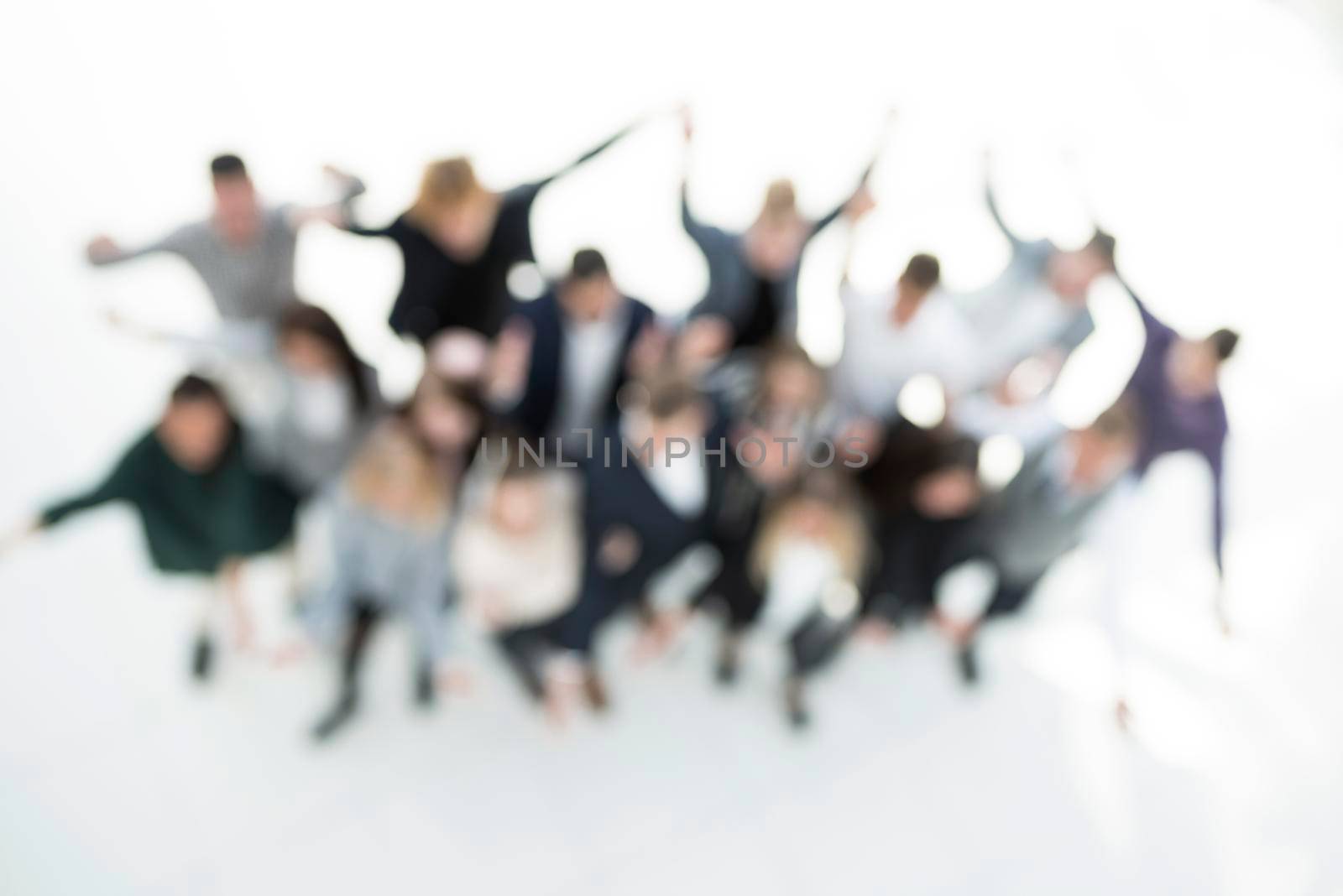 top view. blurry image a group of ambitious young business people. business background