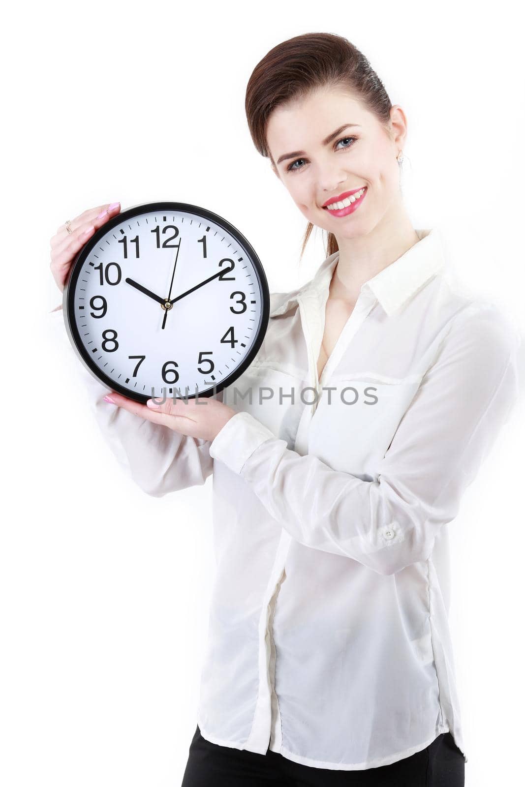 Smiling Business woman holding in hands clock, isolated on white background