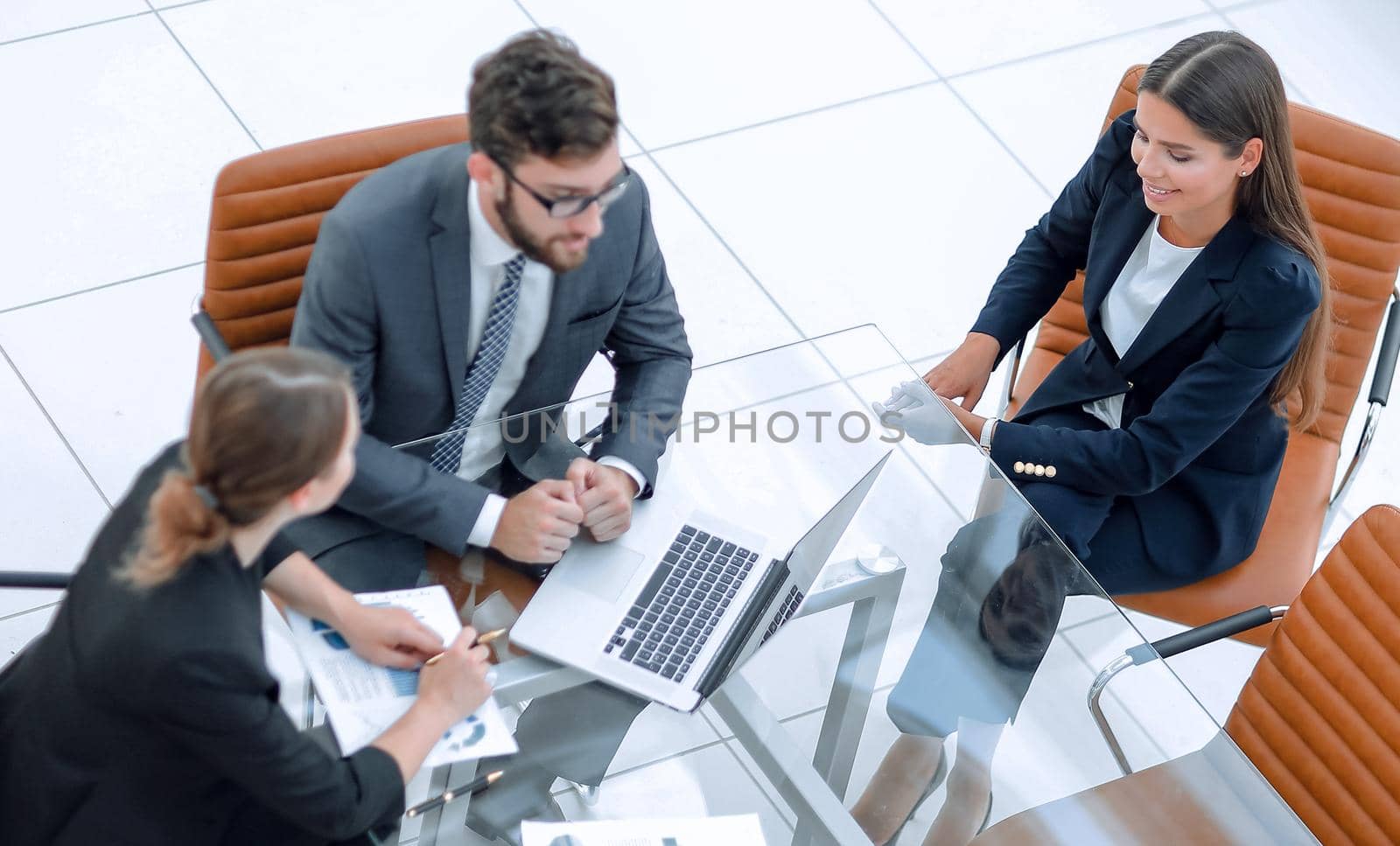 Business people meeting to discuss the situation on the market.business concept