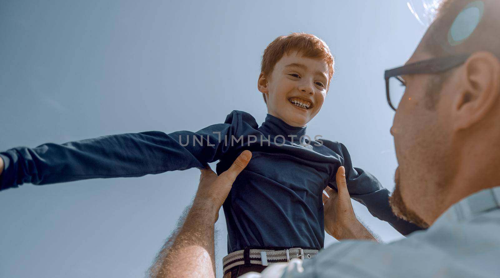 stylized photo.loving father and son.the concept of fatherhood