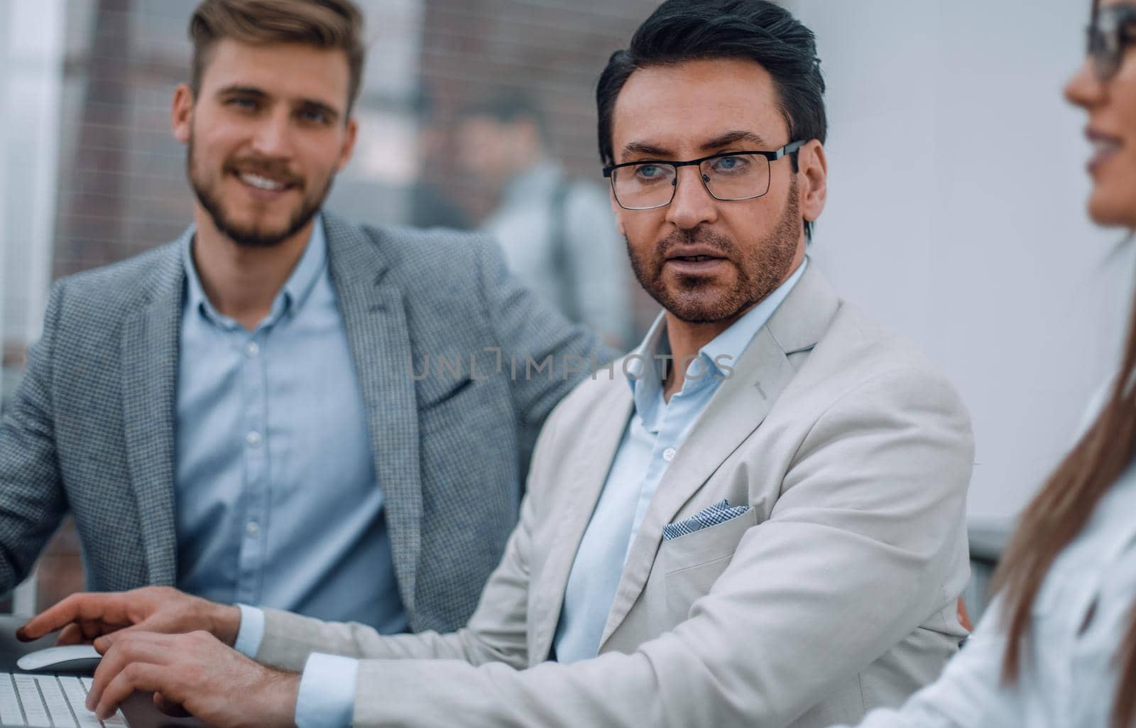 close up.businessman and employees sitting at the Desk.business people