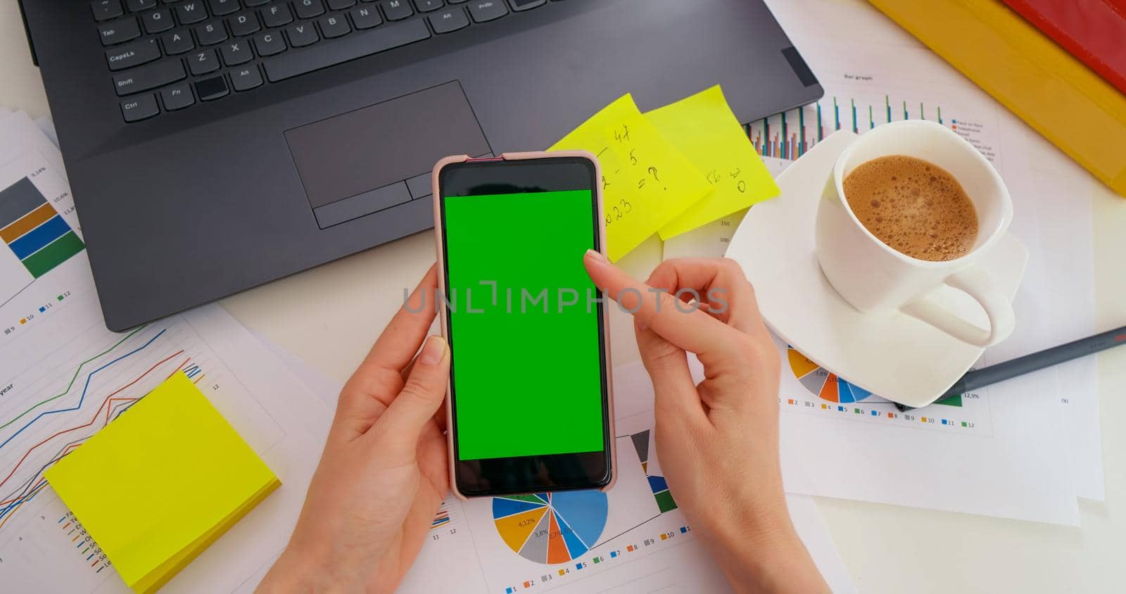 Scrolling gesture on Green Mock-up Screen Chroma Key in business office. by RecCameraStock