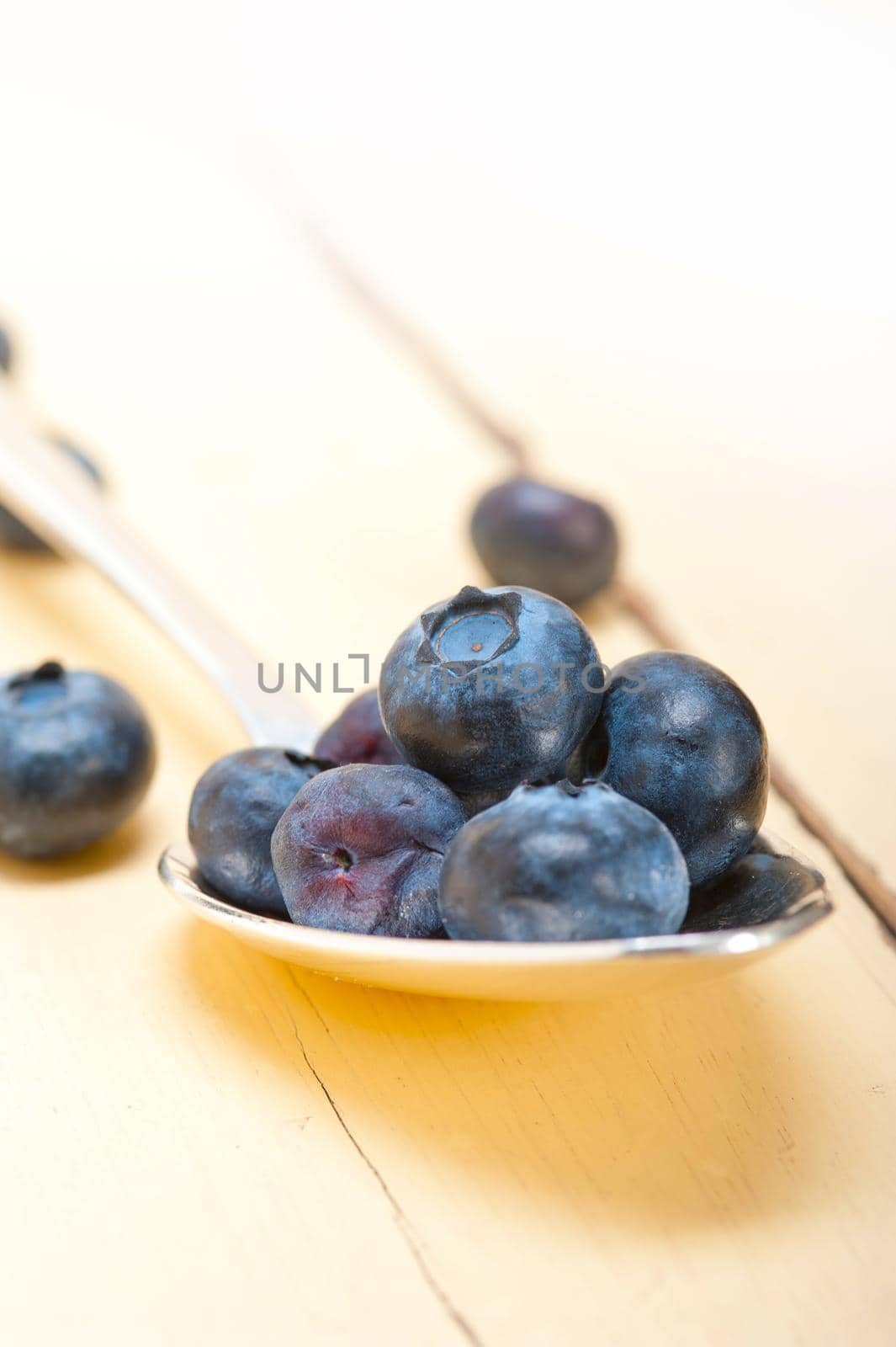 fresh blueberry on silver spoon by keko64