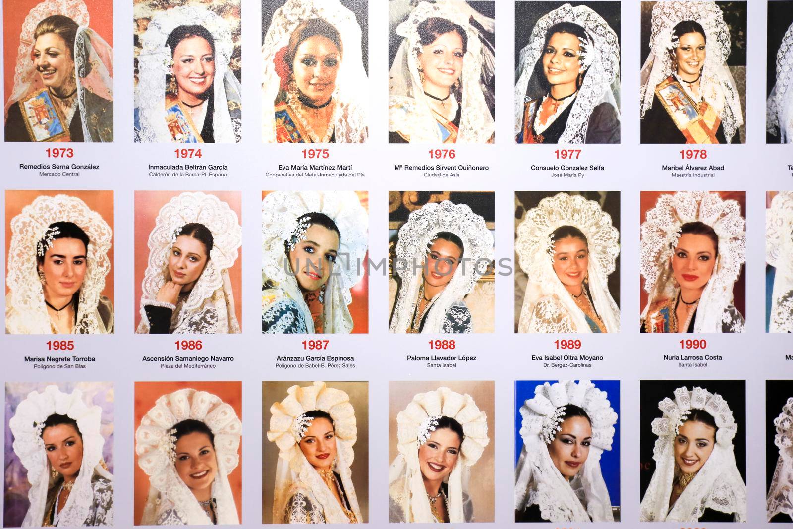 Alicante, Spain- May 12, 2022: Vintage pictures of Belleas del Foc women in traditional costumes exhibited in The Hogueras Museum of Alicante