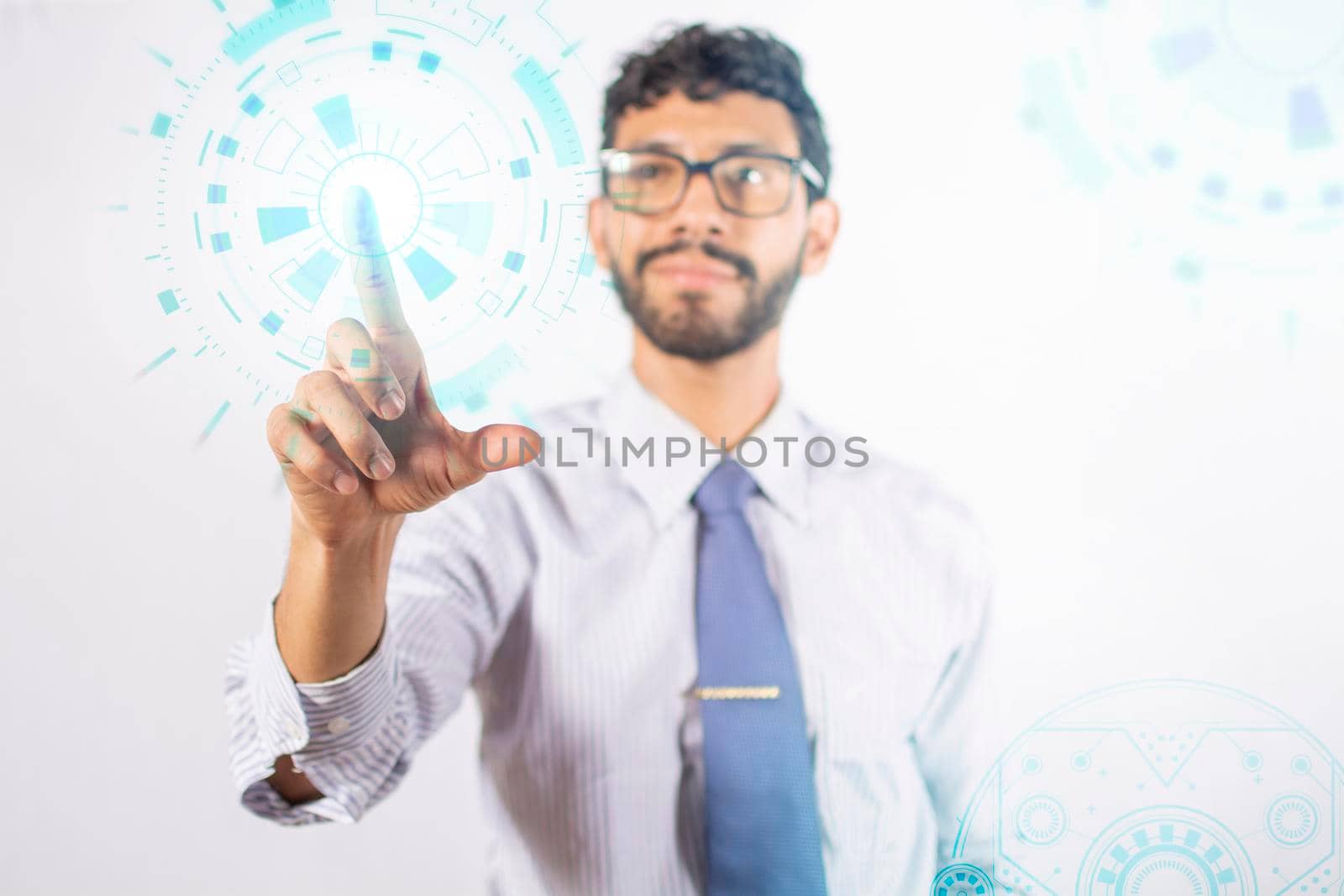businessman touching holographic icons, man selecting technology icons in the air, concept boy touching digital button by isaiphoto