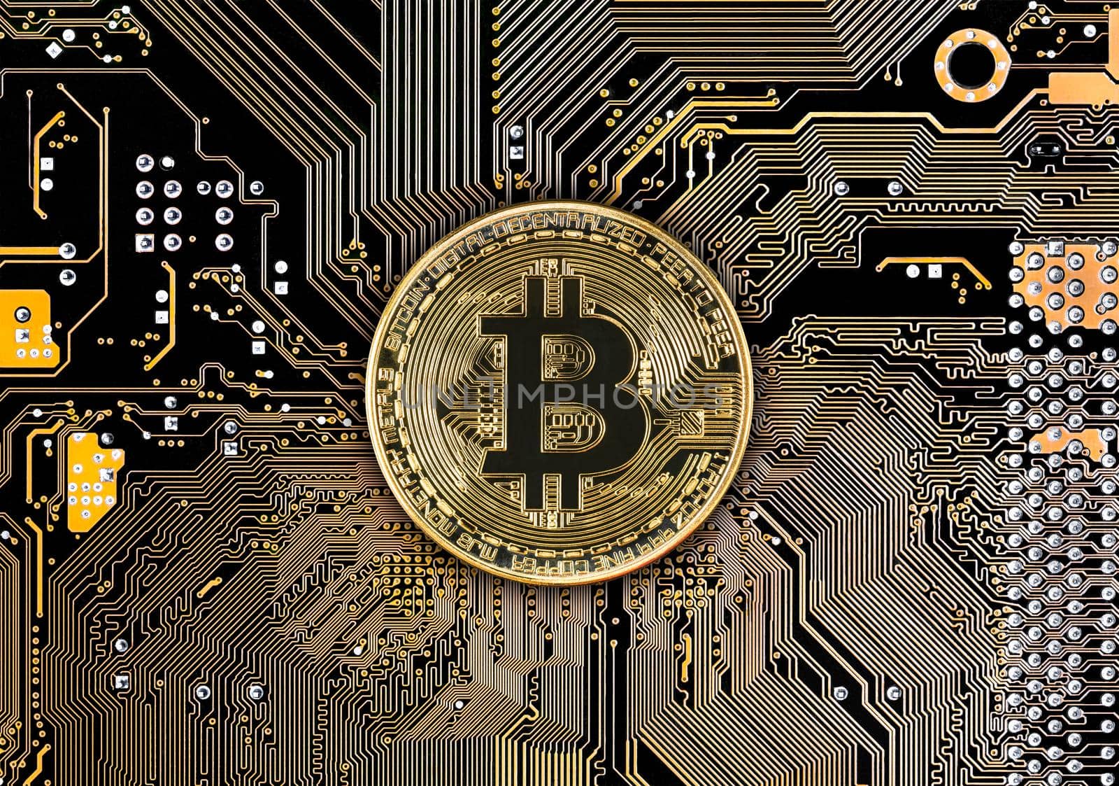 Blockchain technology bitcoin mining concept. Cryptocurrency bitcoin coin on black circuit board