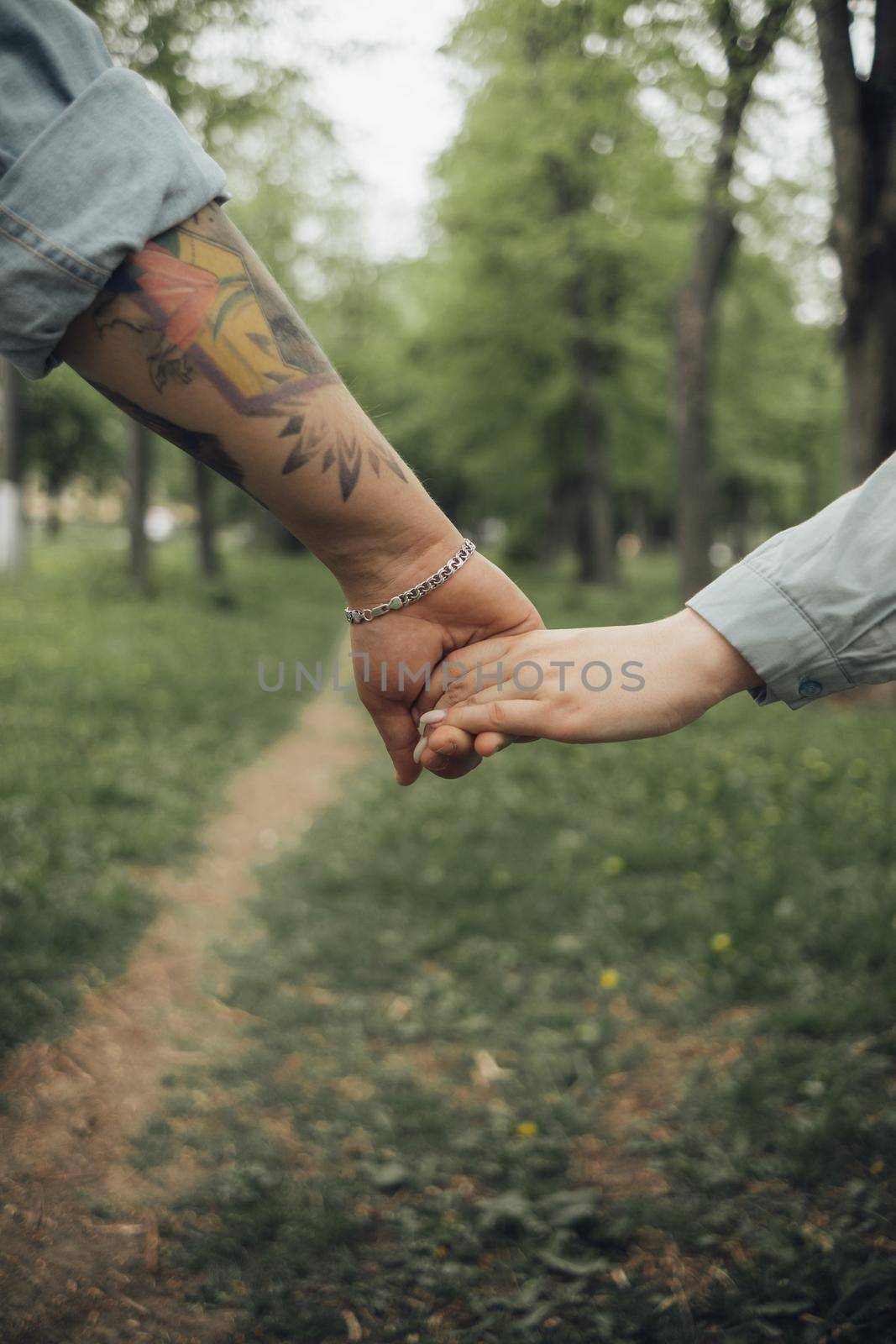loving couple walking in ukrainian park and city