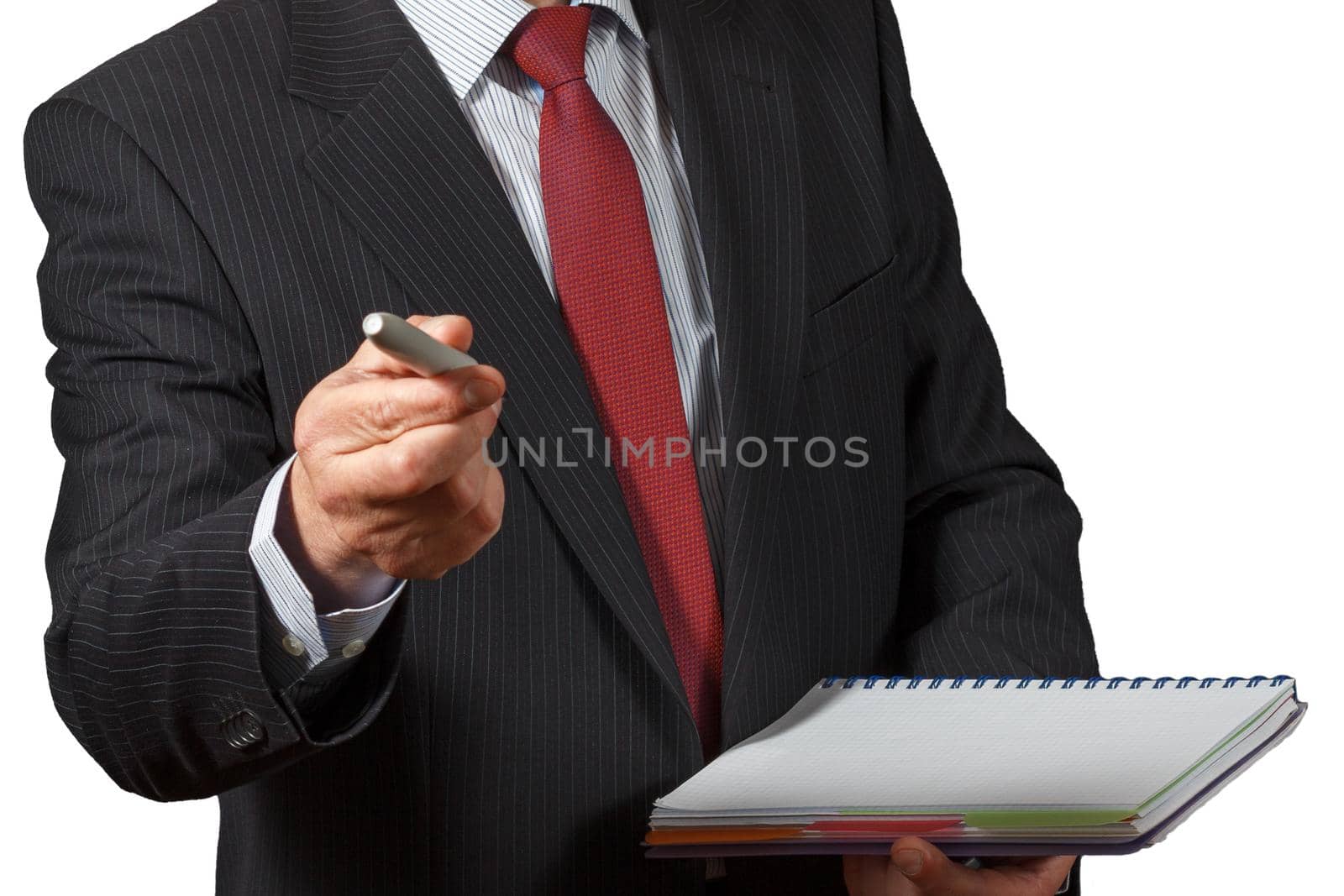 Mature businessman offering a marker and holding a notebook on white isolated background