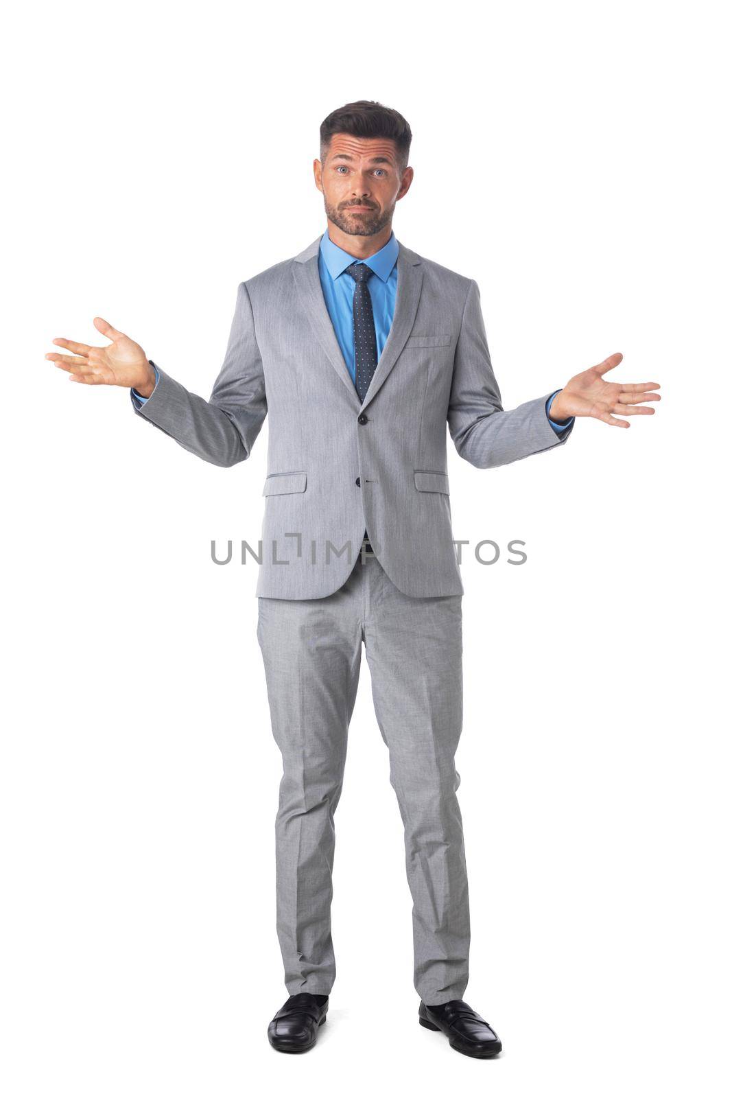 Young handsome business man in formal suit clueless and confused expression. Doubt concept. Studio isolated on white background