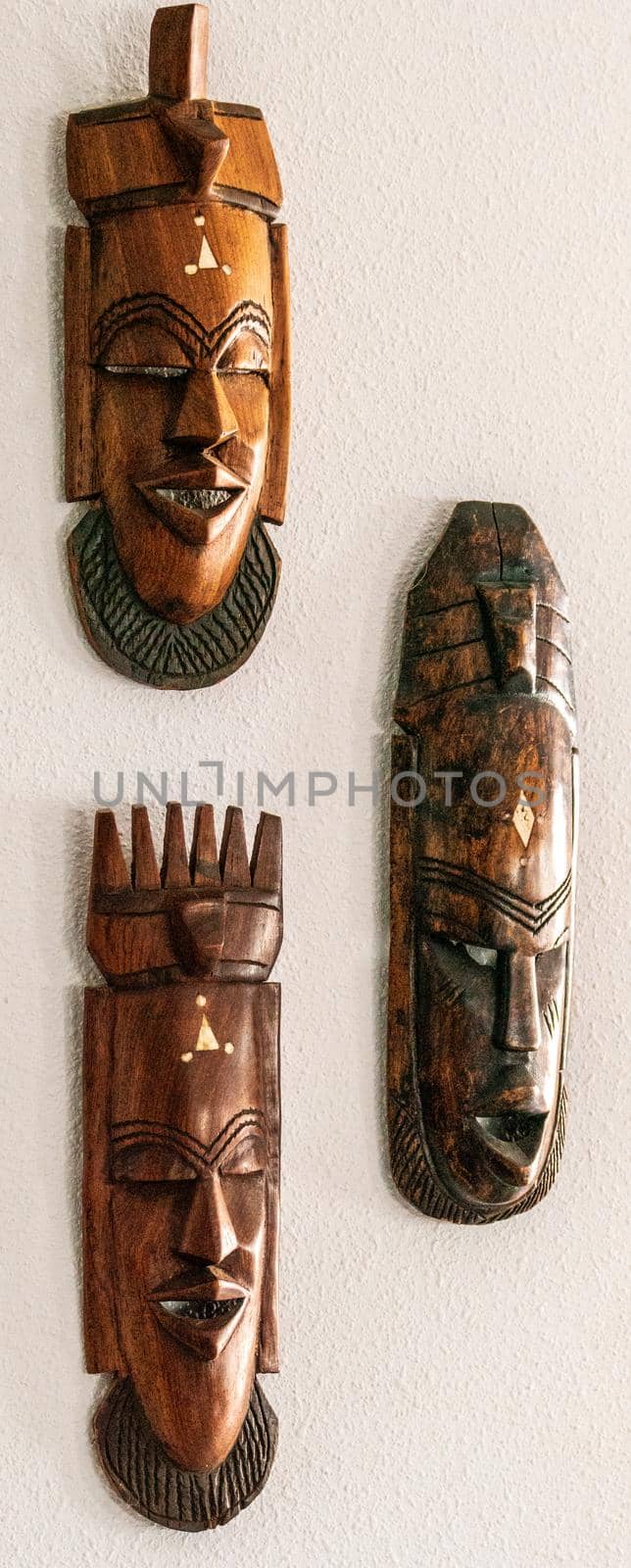 wall mounted hand carved wooden figure heads