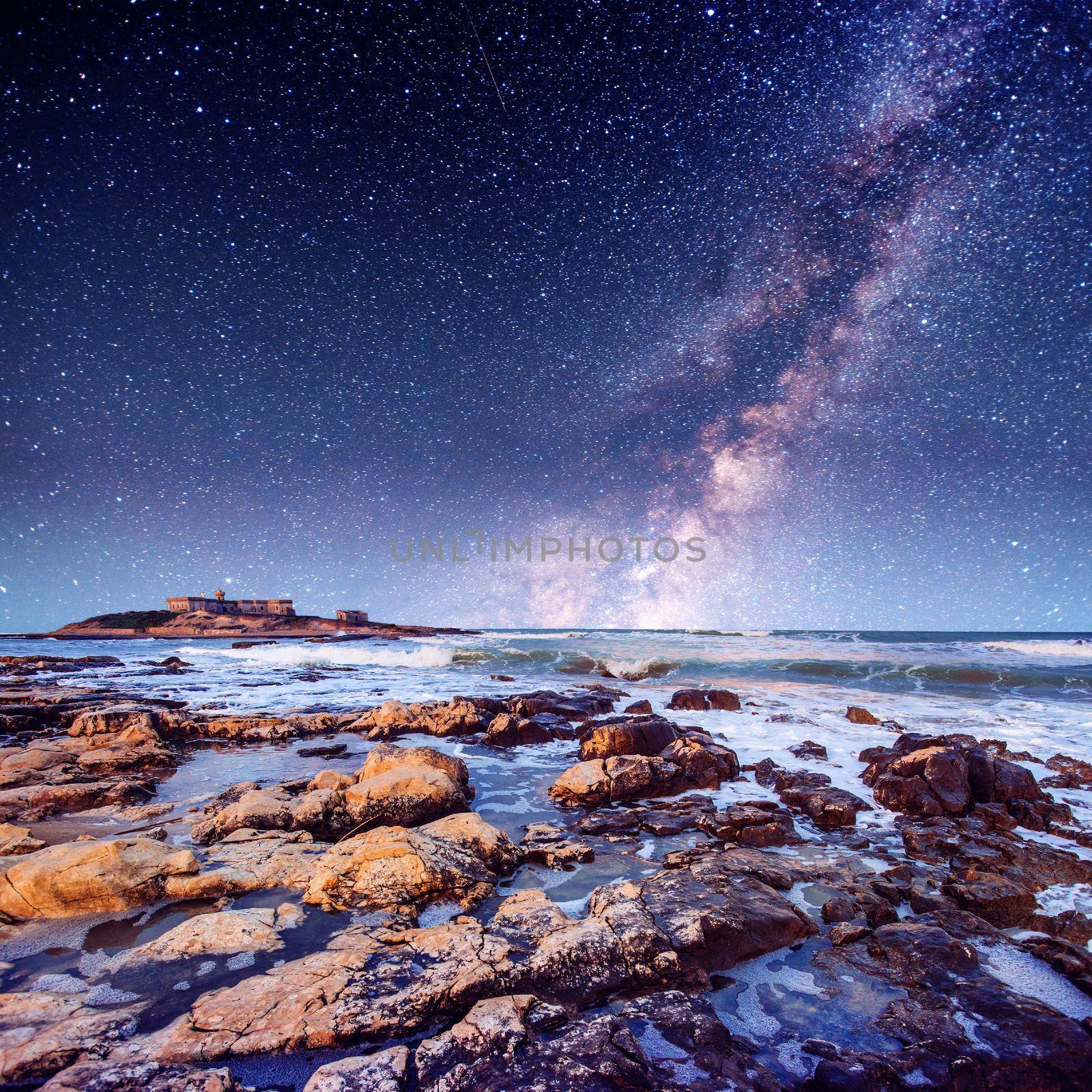 Fantastic views of the starry sky reserve of Monte Cofano. The dramatic scene. Sunset over the sea. Location Cape San Vito. Sicily, Italy, Europe. Mediterranean and Tyrrhenian Sea.