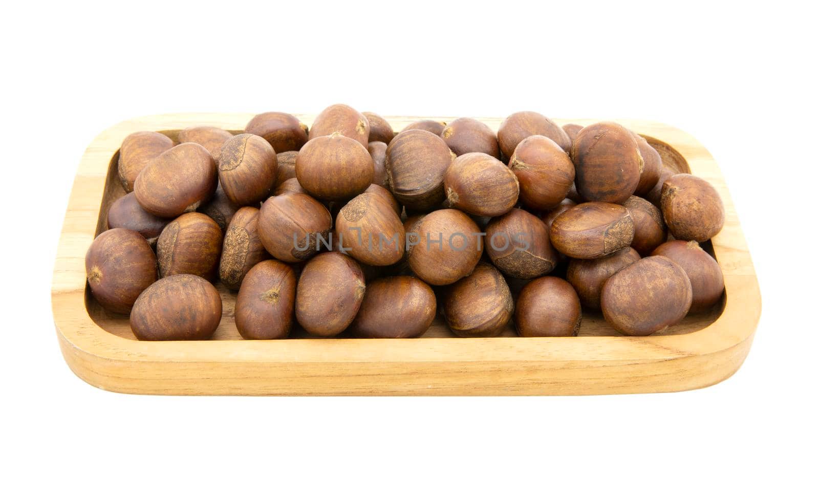 Roasted chesnuts in wooden tray isolated on white background by drpnncpp