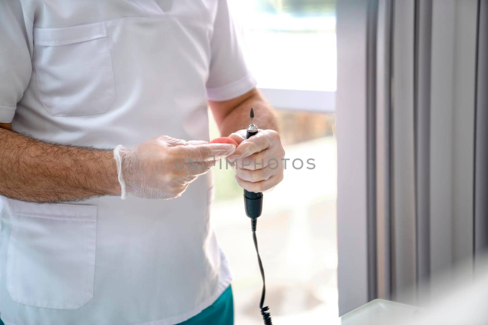 Process of correction of the denture. Close-up