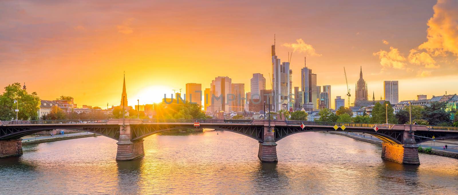 View of Frankfurt city skyline in Germany with sunset light