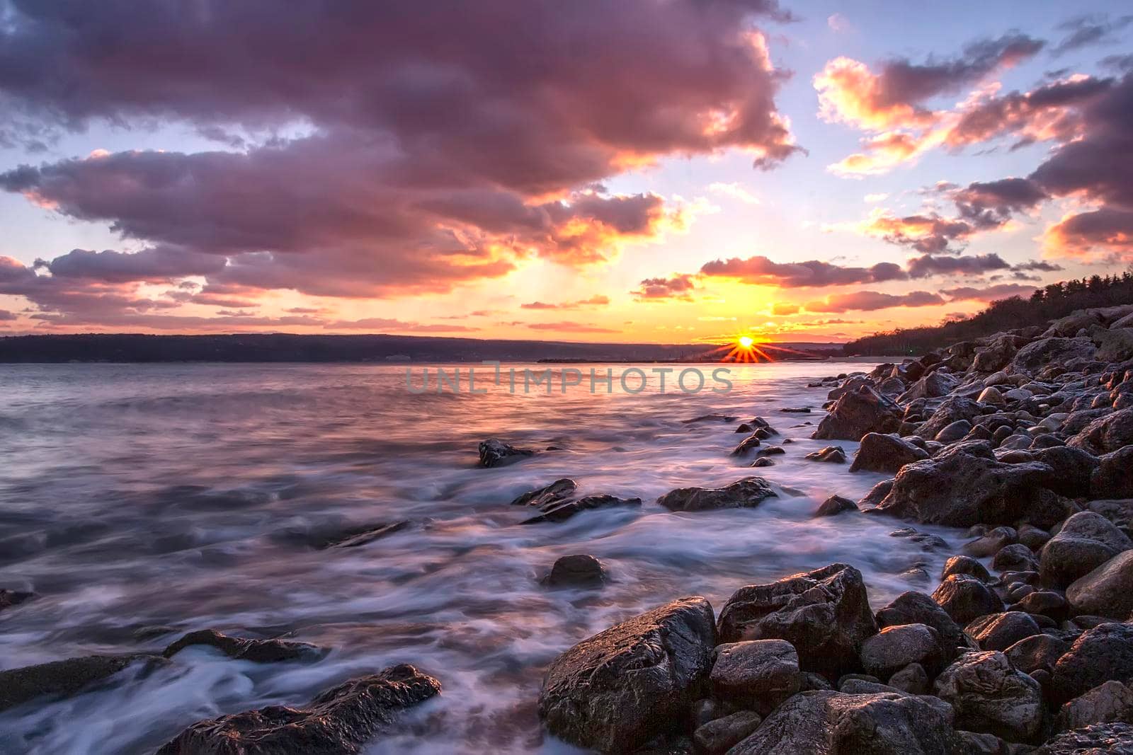 Magnificent sunset over the sea. Bay near Varna, Bulgaria