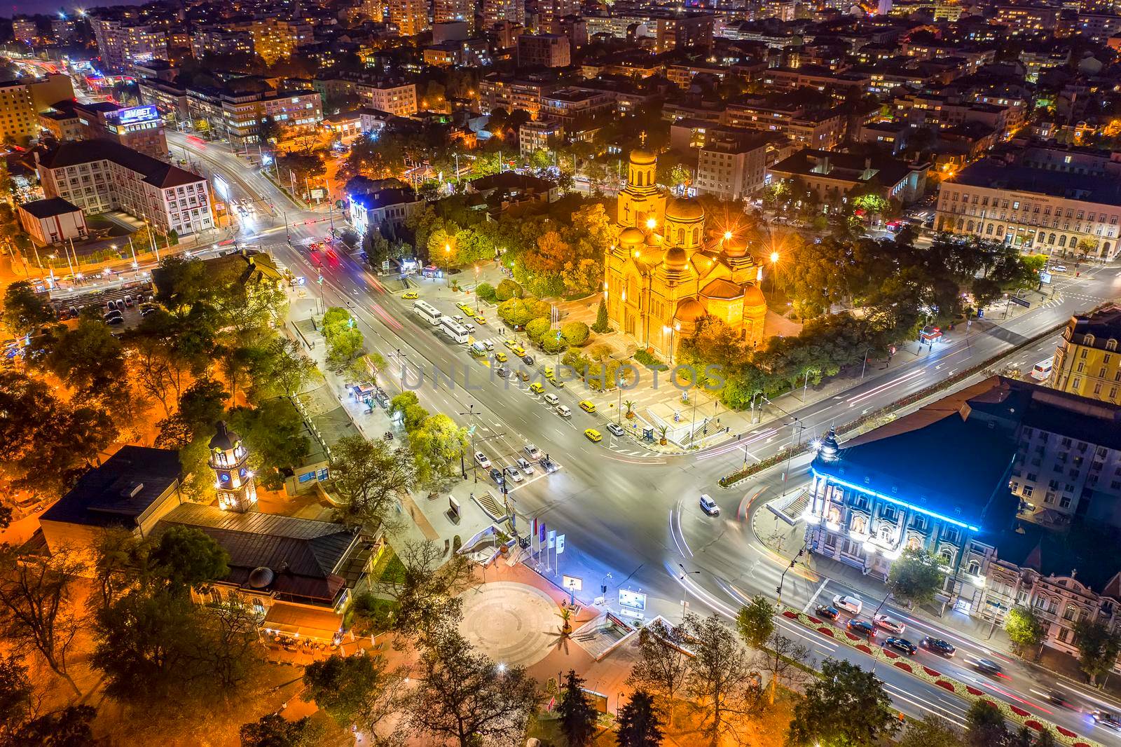 Varna, Bulgaria - October 28, 2019; Aerial view from the drone of the illuminated centrum of Varna city at night