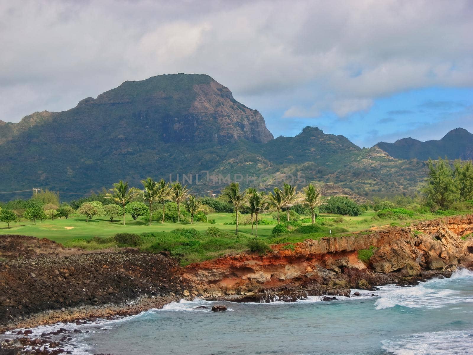 Magnificent Cliff and Ocean Coastline Views along Maha'ulepu Heritage Trail between Shipwrecks Beach and Punahoa Point on Island of Kauai, Hawaii. High quality photo