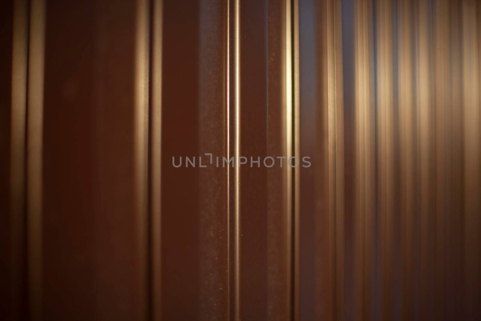 Texture of steel fence. Profile sheet is brown. Fence details. by OlegKopyov