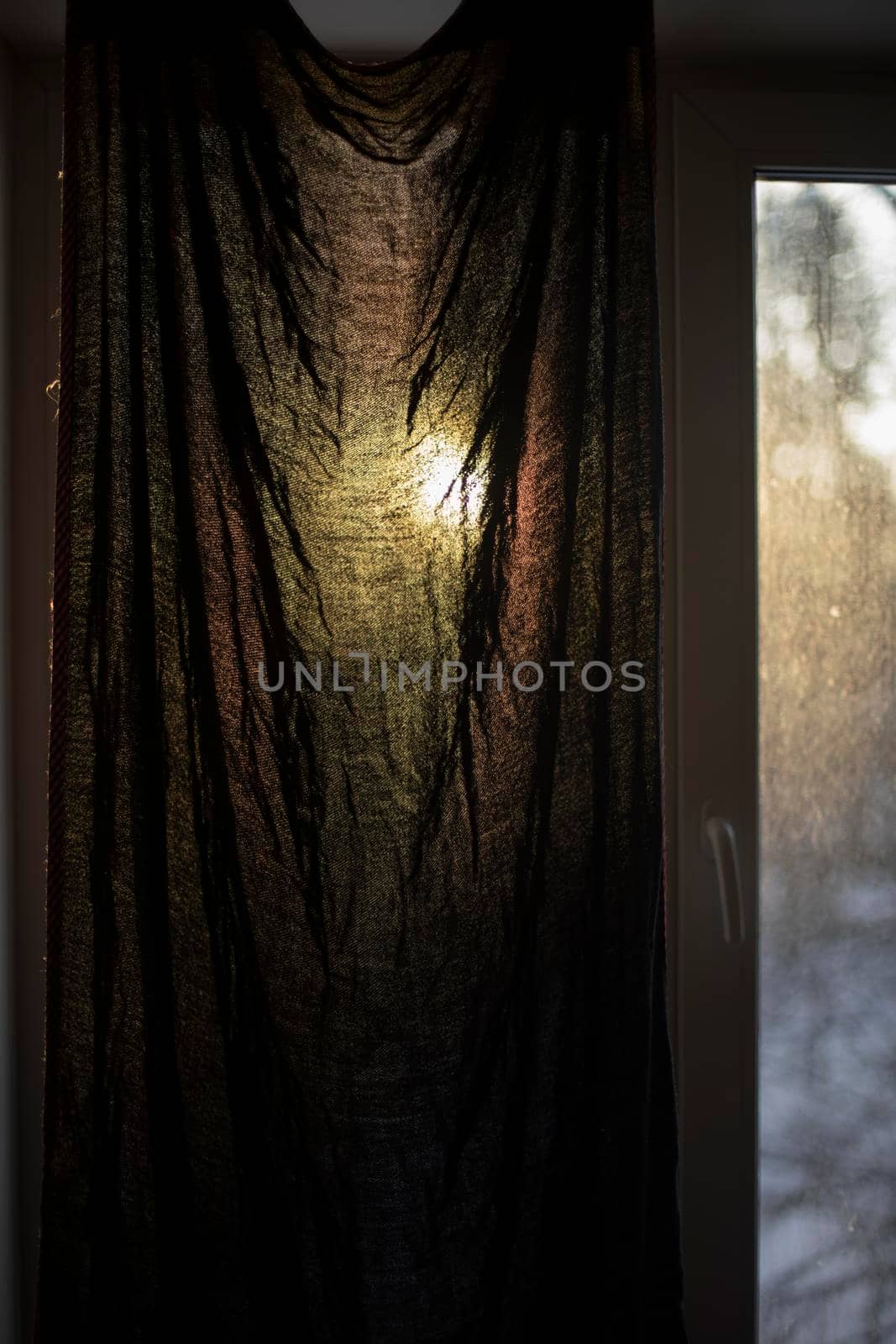 Curtain on window in morning. Dawn outside window. by OlegKopyov