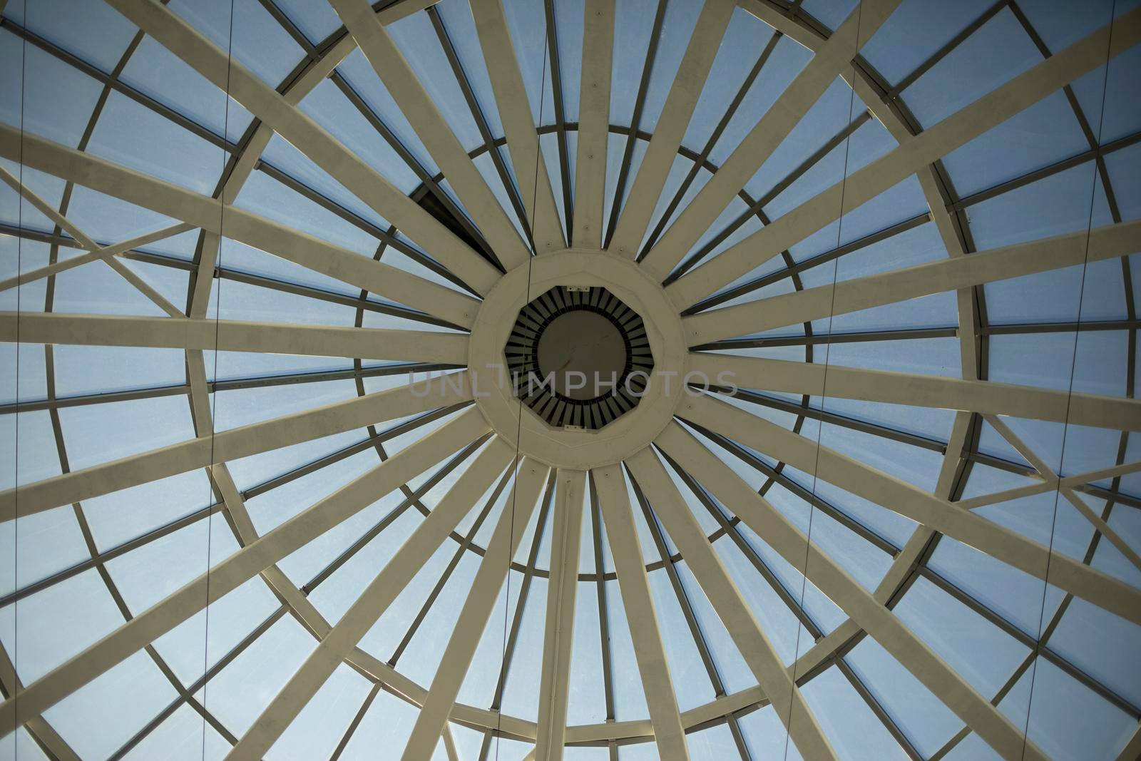 Dome of shopping center. Ceiling in building. Skylight. Architecture details.