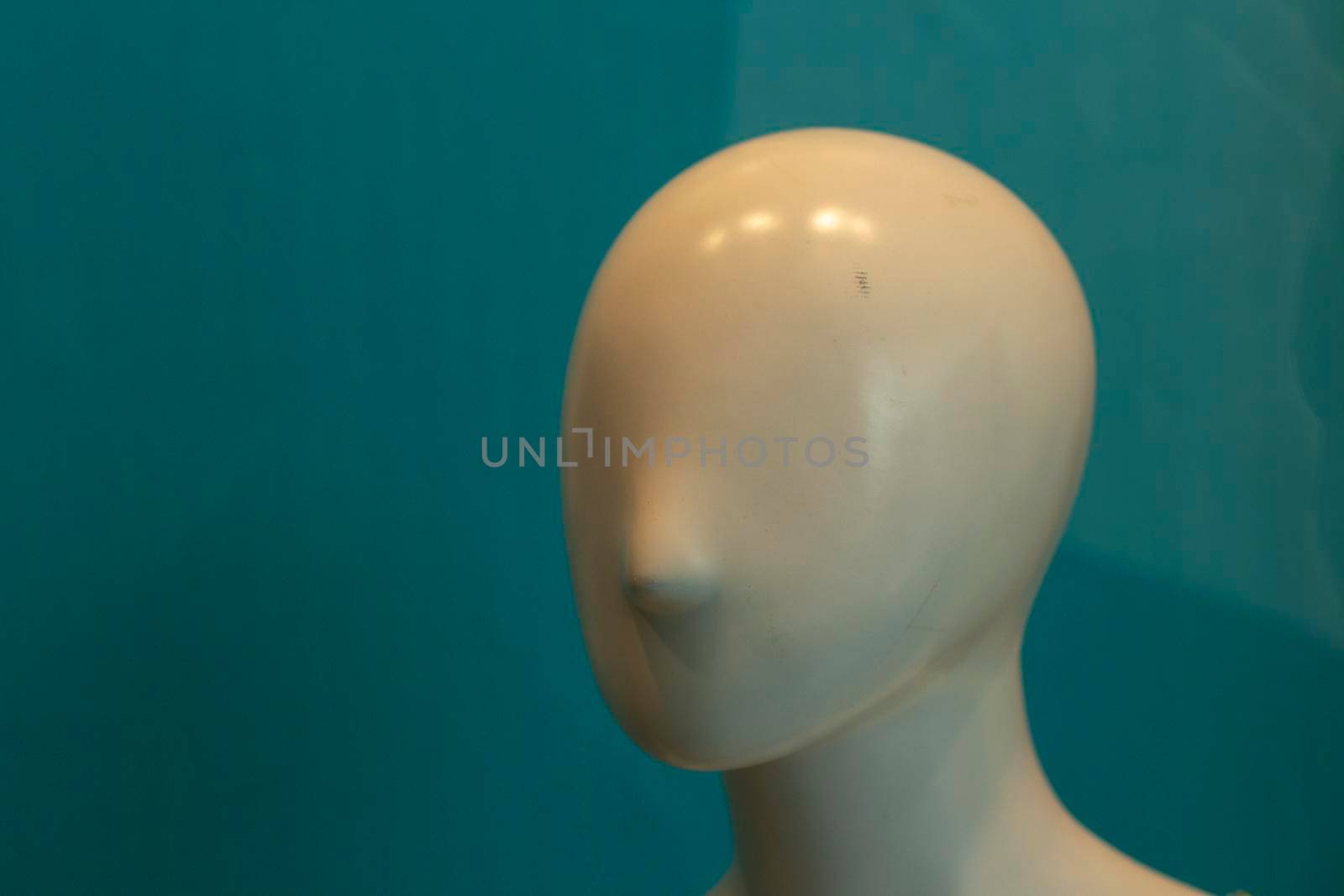 The face of the mannequin without details. Plastic head to show clothes. Mannequin with nose. by OlegKopyov