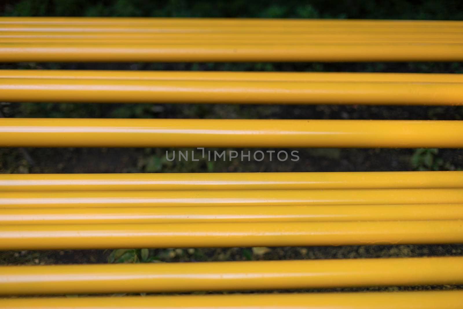 Yellow pipes. Gas pipes lie in row. Preparation of equipment replacement. Details of construction of communications.