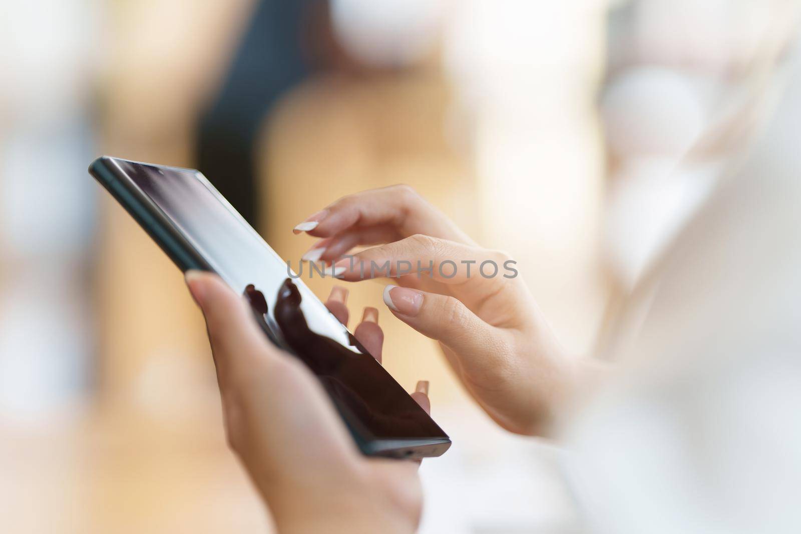 A businesswoman completes KYC using an online banking program in order to open a digital savings account. The definition of cyber security