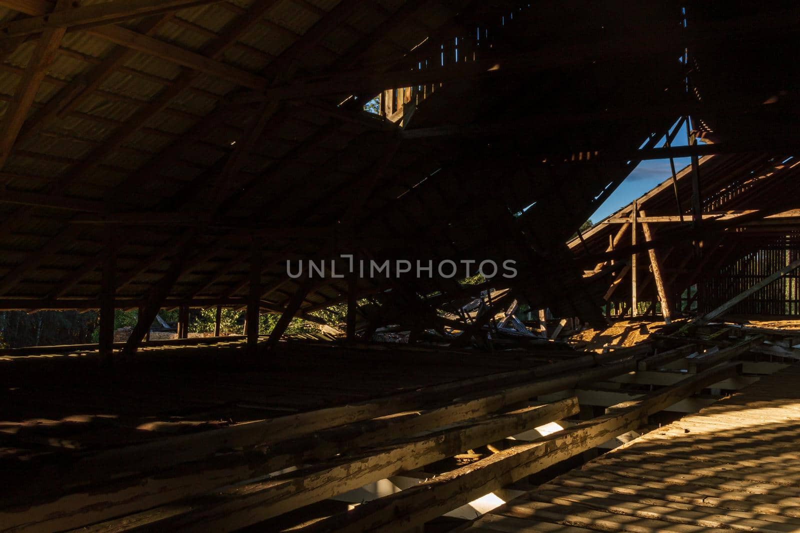 Old farm undeconstruction roof top room broken wood by scudrinja