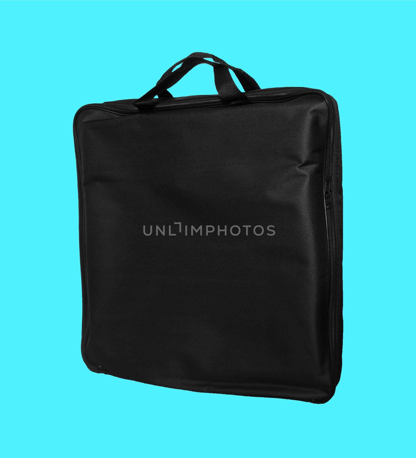 a simple bag made of material, black, for a laptop on a blue background