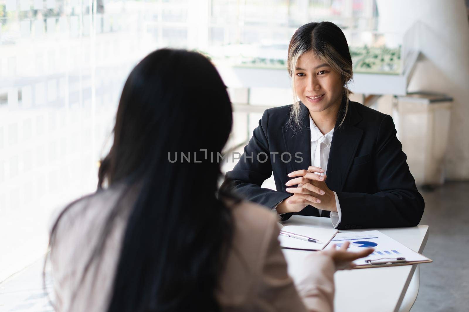During a job interview, HR managers look for a good new employee. Manager have positive first impression of candidate
