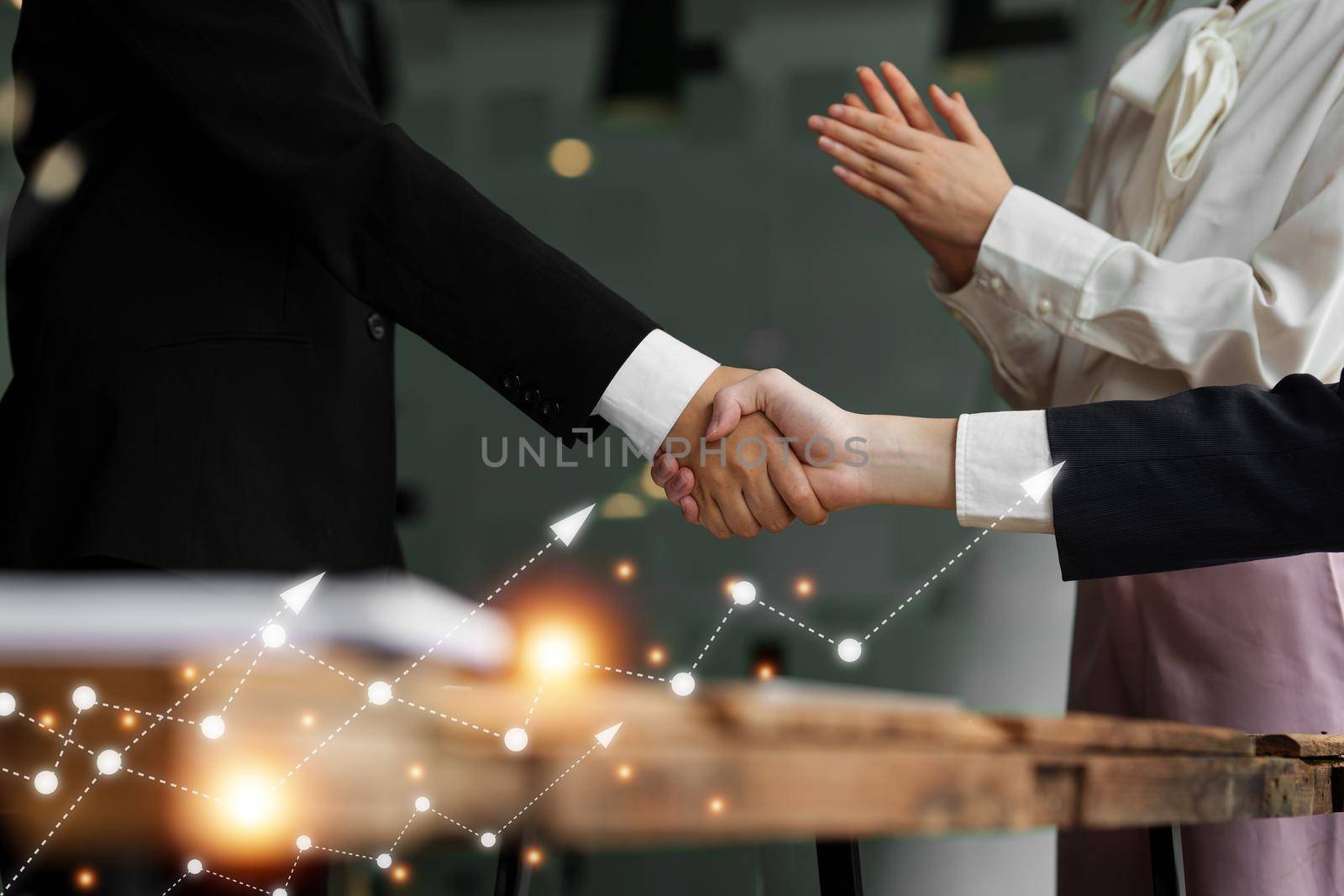 Business partnership meeting concept. Image businessmans handshake. Successful businessmen handshaking after good deal. Group support concept