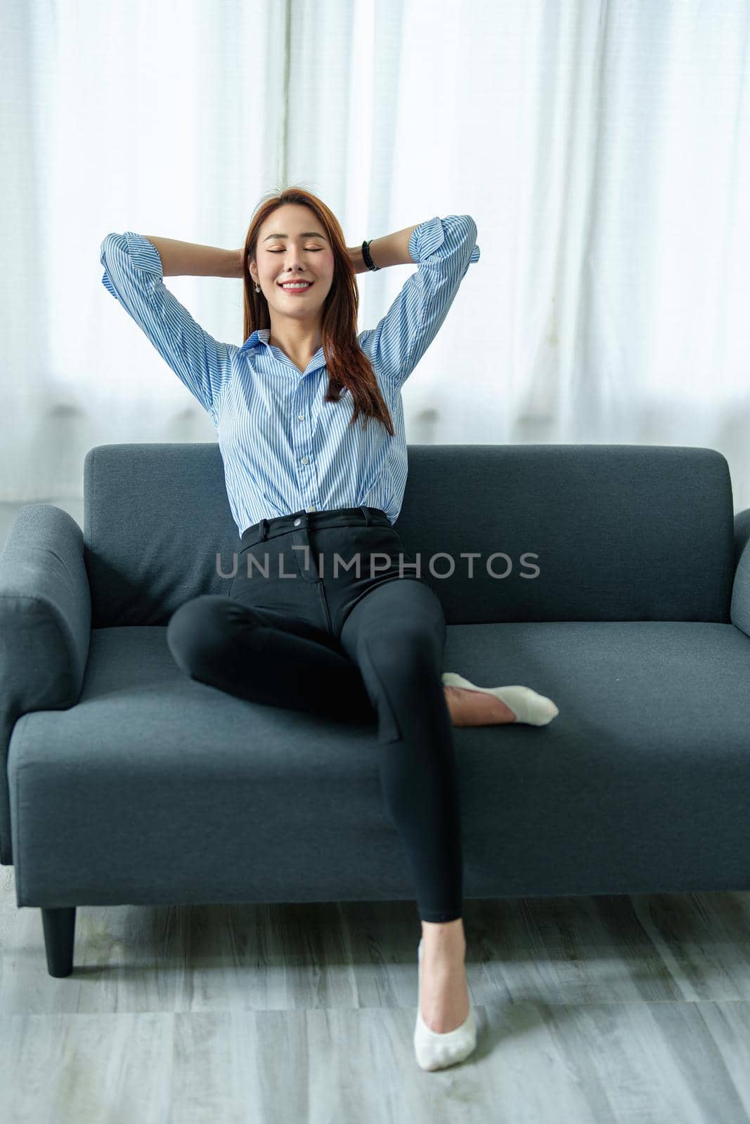personal business, business owner, leisure, pleasure from work, portrait of an Asian woman smiling happily at home.