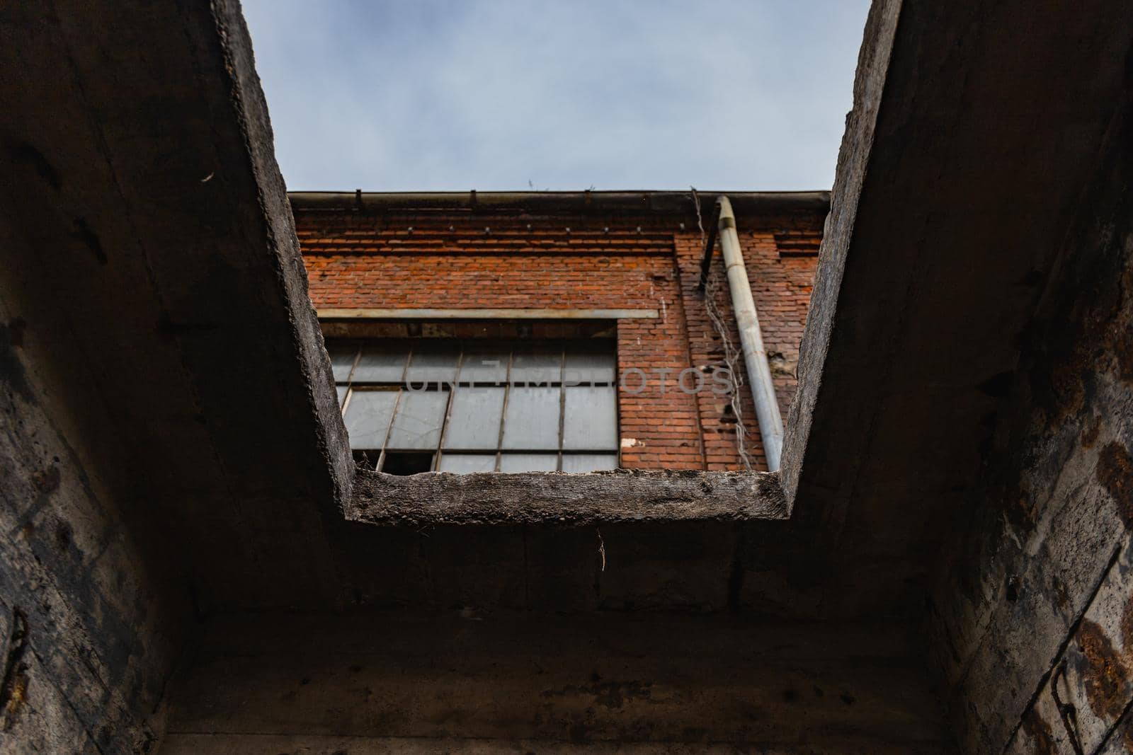 Outdoor view to square and old construction on old boiler building by Wierzchu